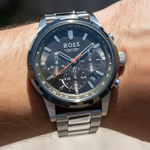 Close up shot of Hugo Boss Solgrade 1514034 watch on wrist showing the solar dial texture and green color