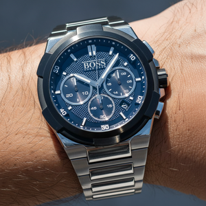 Close up shot of Hugo Boss Supernova 1513360 watch on wrist showing the textured blue sub-dials