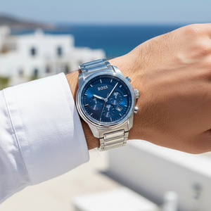Male model wearing Hugo Boss Trace 1514007 silver watch with a casual denim outfit