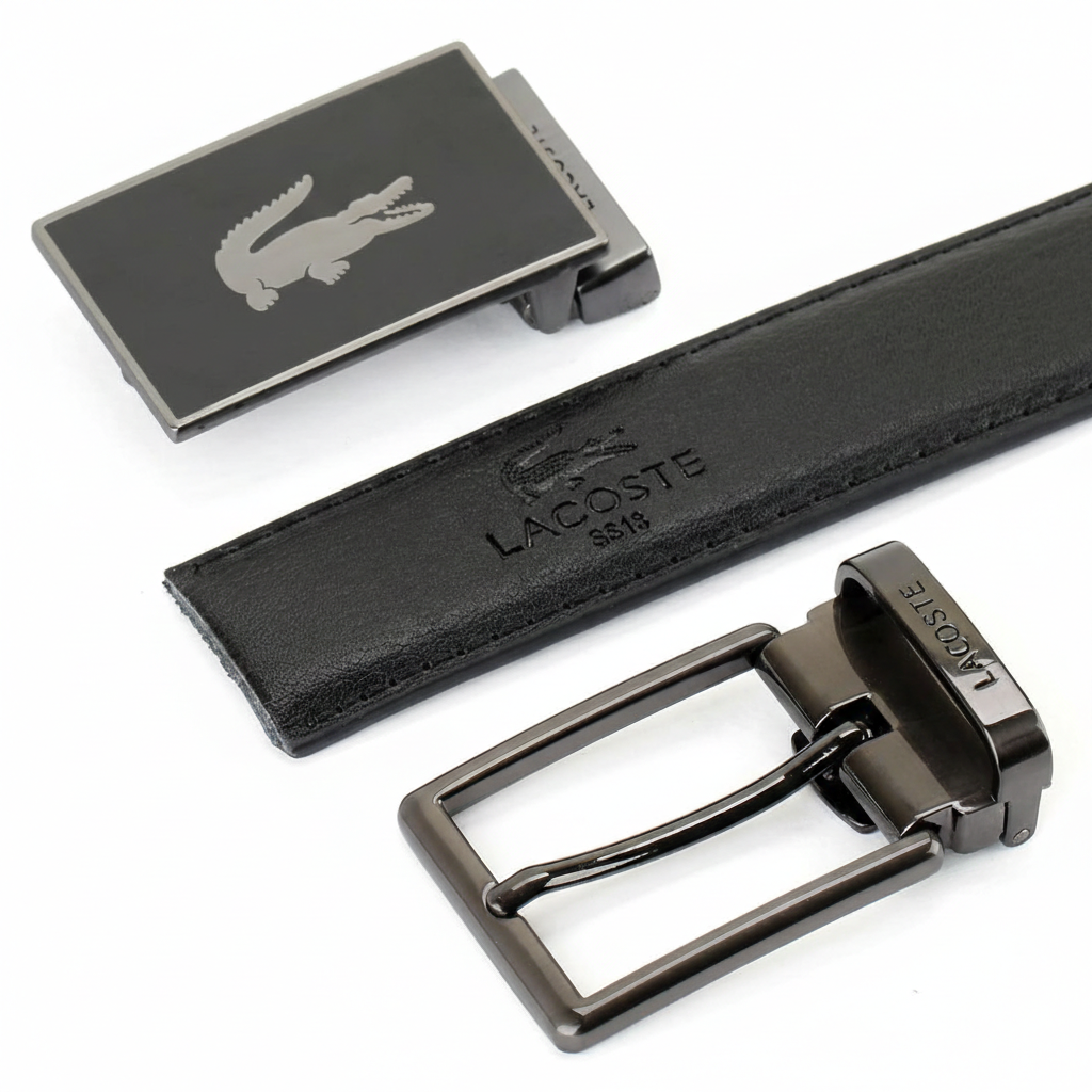 Top-down view of the Lacoste reversible belt showcasing the black leather side and its two interchangeable designer metal buckles