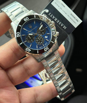 Authentic real-life photo of the Maserati Competizione R8873600009 watch showing actual blue dial and black bezel finish