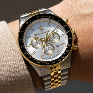 Close up shot of Maserati Sfida R8873640024 on wrist showing the silver dial and gold-tone jubilee bracelet