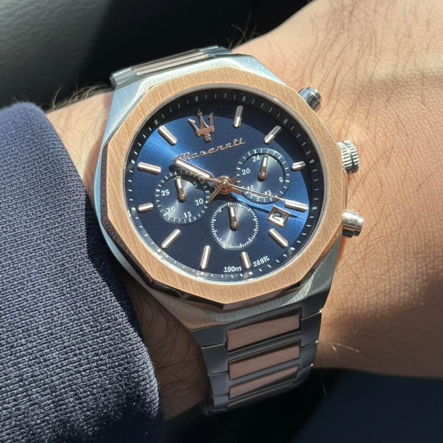 Close up shot of Maserati Stile R8873642002 on wrist showing the navy blue textured dial and rose gold accents