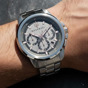 Close up shot of Maserati Successo R8873621004 watch on wrist showing the grey sunray dial and rose gold hands