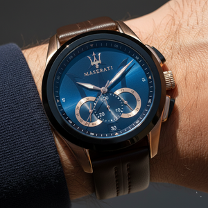 Close up shot of Maserati Traguardo R8871612024 on wrist showing the blue sunray dial and rose gold trident