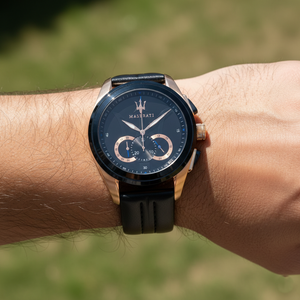 Close up shot of Maserati Traguardo R8871612025 on wrist showing the black dial and rose gold trident logo