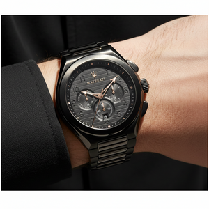 Close up shot of Maserati Triconic R8873639003 on wrist showing the black dial and rose gold chronograph details