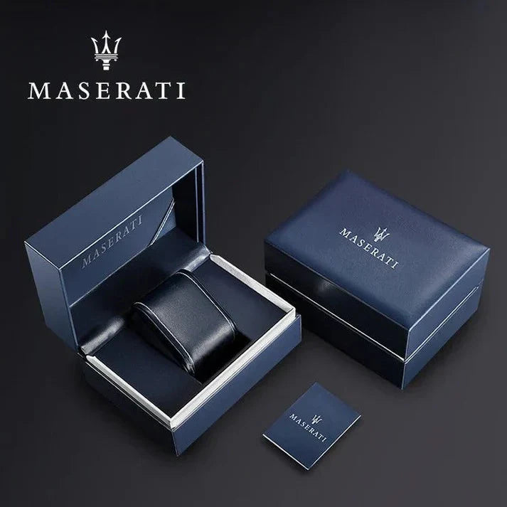 Maserati jewelry set with blue box, pendant, and card on a dark background