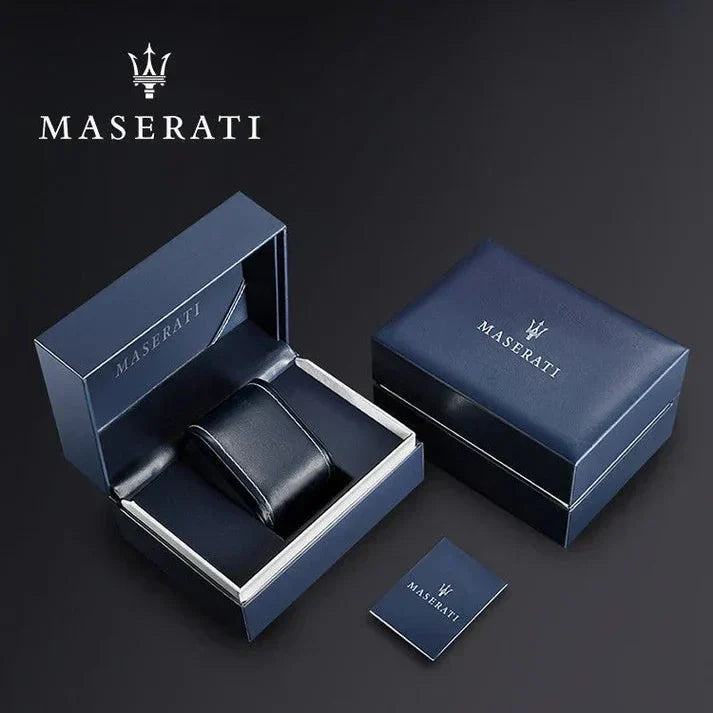 Maserati branded jewelry set with box and card on a dark background