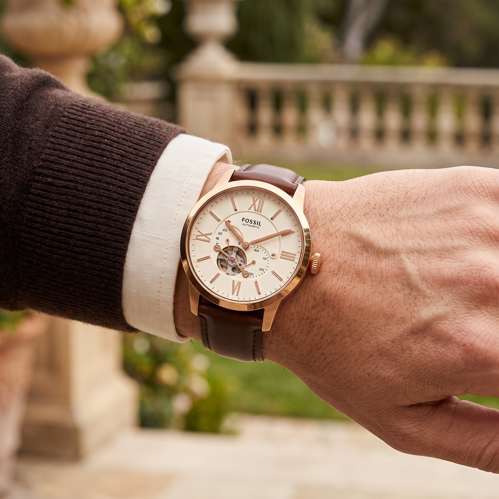 Luxury lifestyle image featuring the Fossil Townsman ME3105 automatic watch.