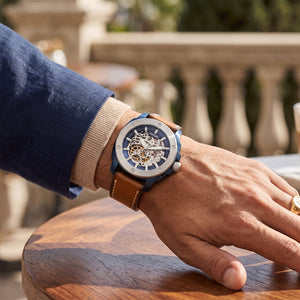 Fossil Modern Machine ME3135 men's automatic watch worn on the wrist.
