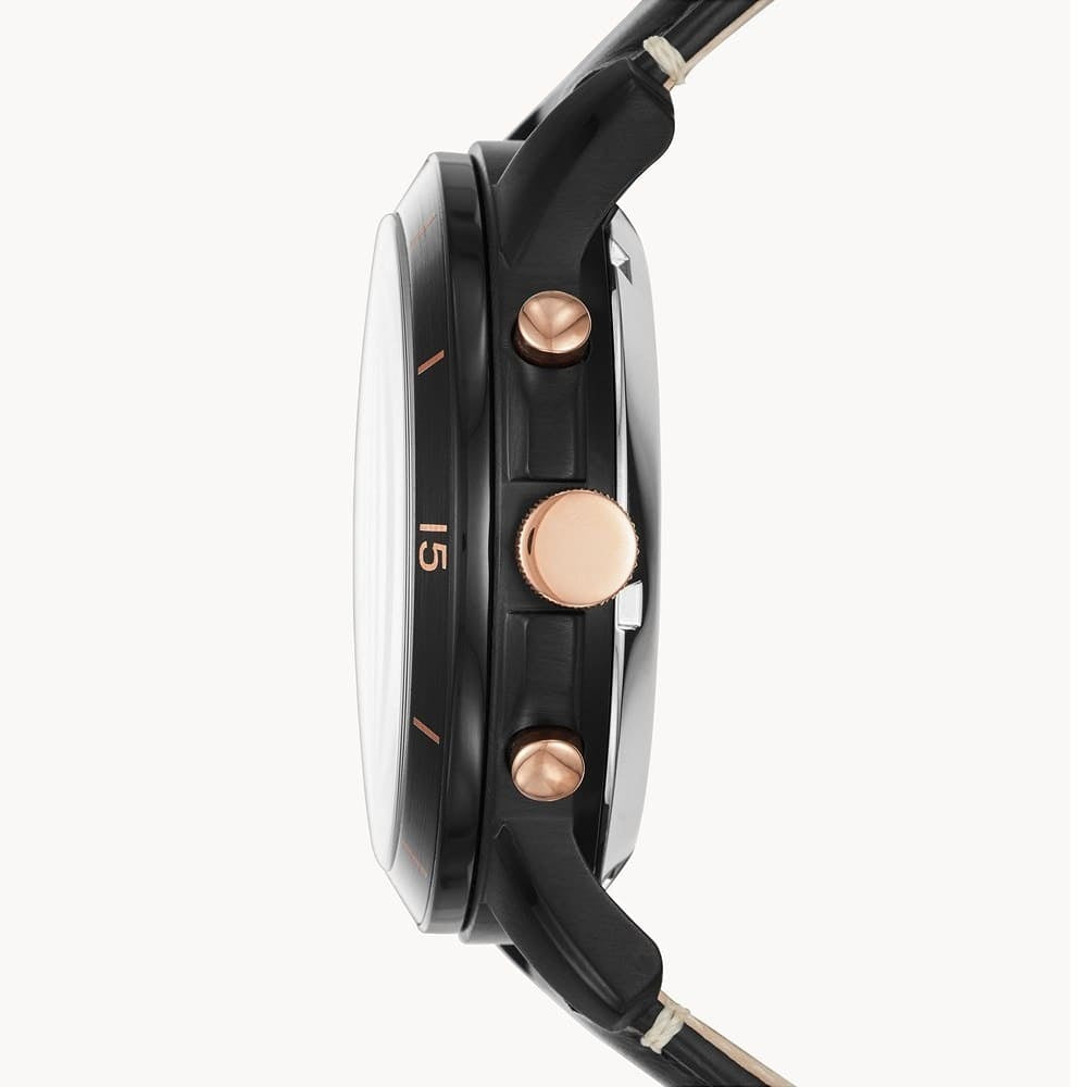 Close-up of a watch with black strap and rose gold accents on a white background