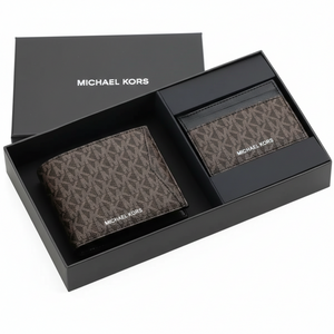 Top-down view of a Michael Kors men's brown MK patterned wallet and matching cardholder securely displayed inside an open black branded gift box