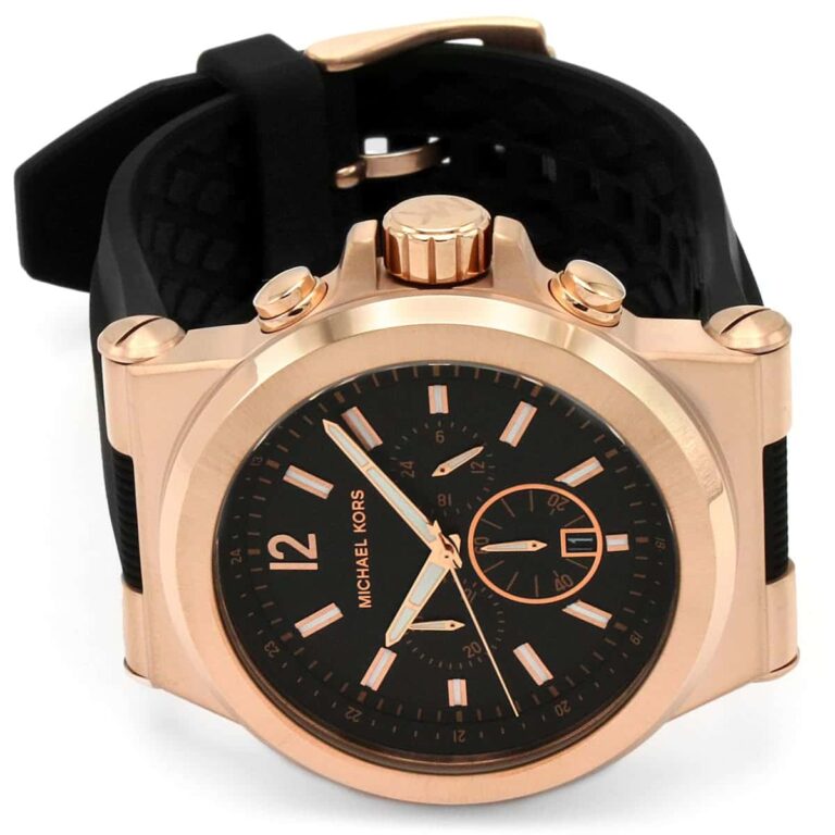 Close-up of the rose gold-tone Michael Kors branding on the black chronograph dial of the MK8184