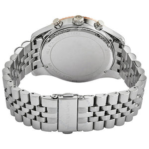 Caseback of Michael Kors Lexington MK8689 men's quartz battery watch showing technical specs navy blue dial and silver metal bracelet