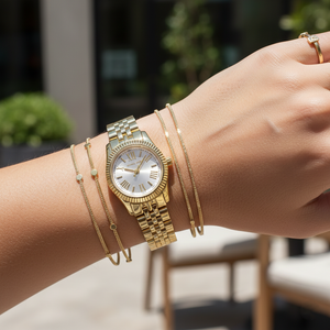 Close up shot of Michael Kors MK3229 on wrist showing the delicate 26mm size and gold-tone finish