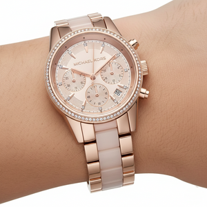 Extreme close-up of Michael Kors MK6307 showing blush pink acetate center links