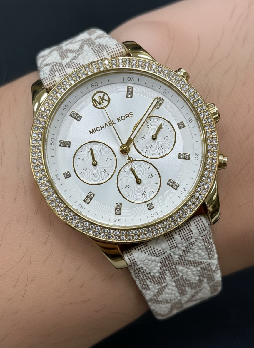 Close-up of Michael Kors MK6967 white chronograph dial and double-row pave crystal bezel