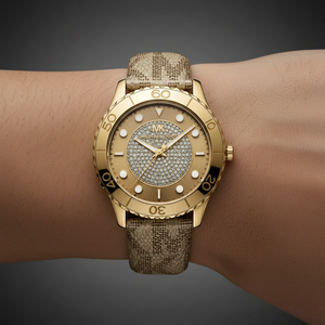 Extreme close-up of Michael Kors MK6999 showing gold dial with pave crystal center