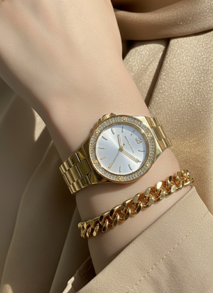 تفاصيل مينا ساعة Michael Kors MK7278 الفضية والمؤشرات الذهبية وإطار الكريستال