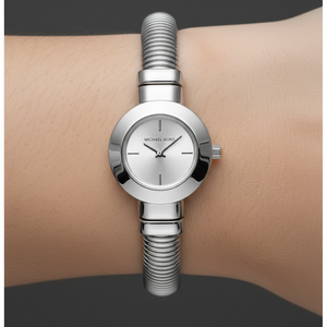 Extreme close-up of Michael Kors MK7529 showing silver flexible bangle texture