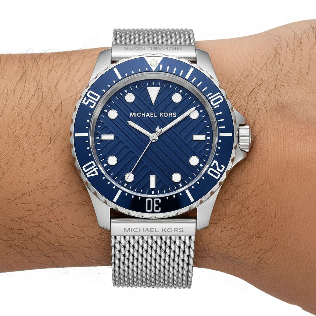 Extreme close-up of Michael Kors MK9082 showing blue textured dial and silver mesh