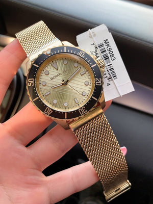 Michael Kors MK9083 Everest on male wrist showing smart casual look