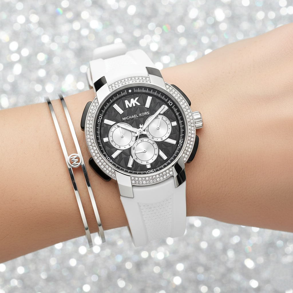 Close up of the MK6947 black dial showing the embossed MK pattern and silver-tone multi-function sub-dials