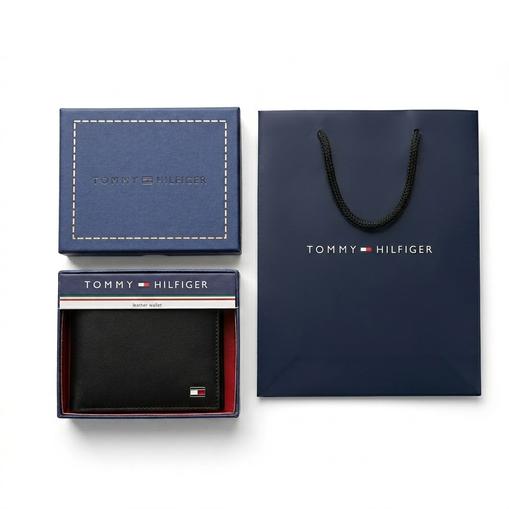 Full premium presentation of the Tommy Hilfiger mirror original smooth black leather wallet with its matching detachable card case set, navy gift box, and shopping bag