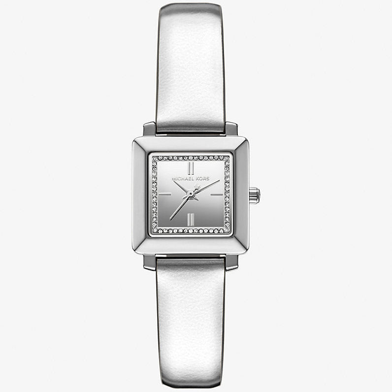 Authentic real-life photo of Michael Kors MK1219 showing actual silver metallic leather and crystal bezel
