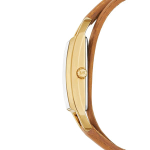 Angled real-life photo of Michael Kors MK4721 showing the polished gold case and oversized MK logo dial