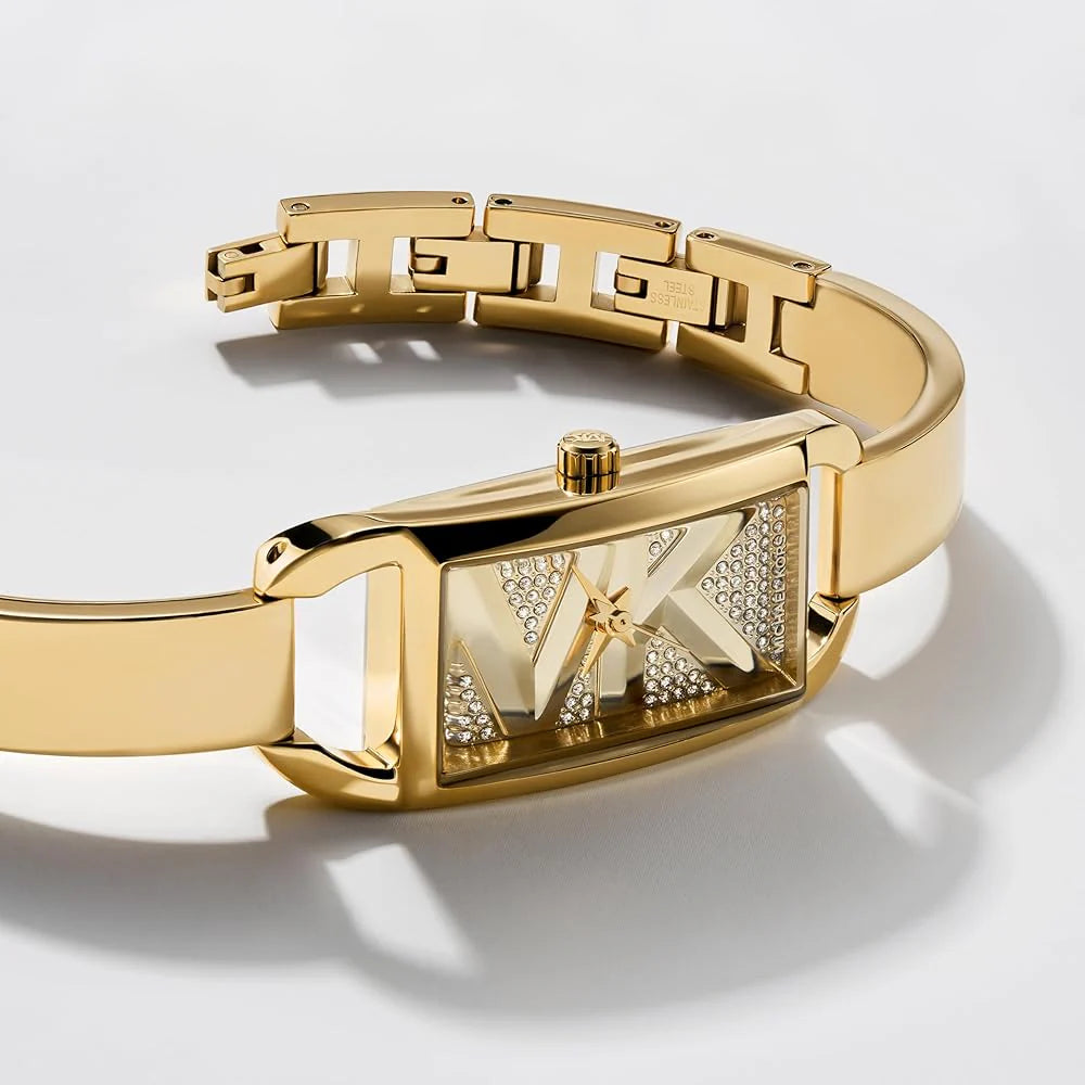 Close up photo of the gold-tone stainless steel smooth bracelet on the Michael Kors MK4840