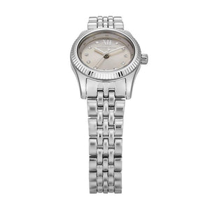Angled real-life photo of Michael Kors MK4843 showing the polished silver case and fluted detail