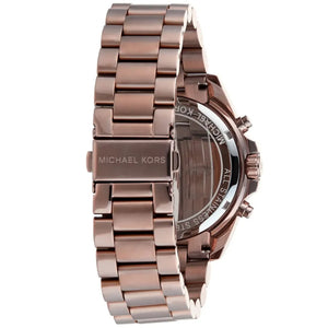 Rose gold watch with Michael Kors branding on a white background