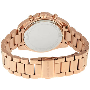 Caseback of Michael Kors Bradshaw MK6321 women's quartz battery watch showing technical specs rose gold dial and metal bracelet