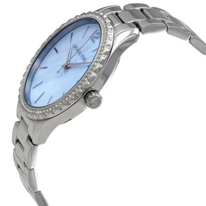 Angled real-life photo of Michael Kors MK6847 showing the polished silver case and crystal detail