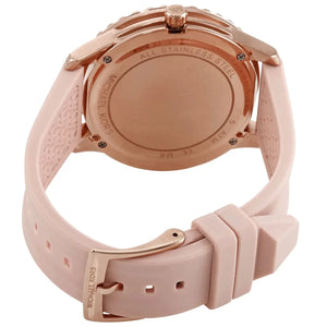 Back view of a Michael Kors watch with rose gold case and pink silicone strap on a white background