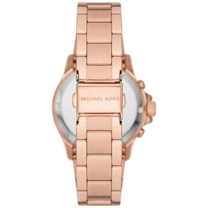 Caseback of Michael Kors Everest MK7213 women's quartz battery watch showing technical specs white dial and rose gold metal bracelet