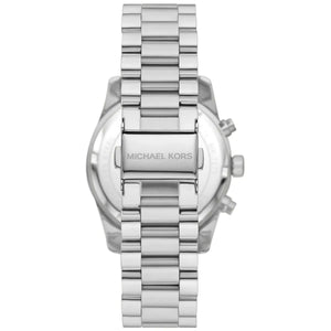 Caseback of Michael Kors Lexington MK7277 women's quartz battery watch showing technical specs blue dial and silver metal bracelet