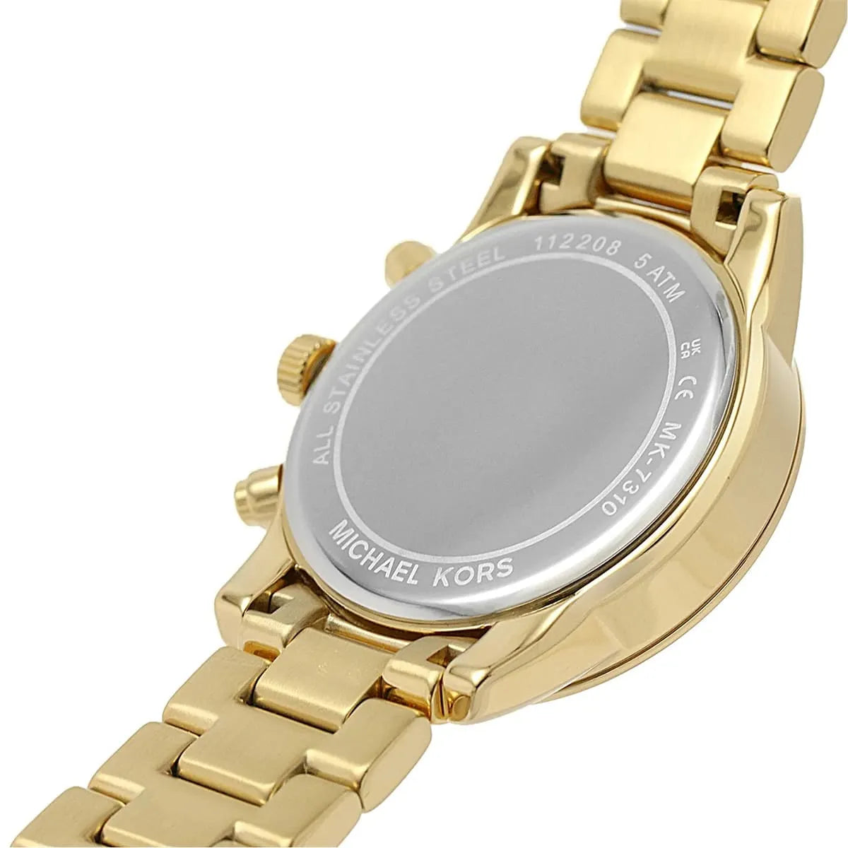 Caseback of Michael Kors Parker MK7310 women's quartz battery watch showing technical specs pavé dial and gold metal bracelet