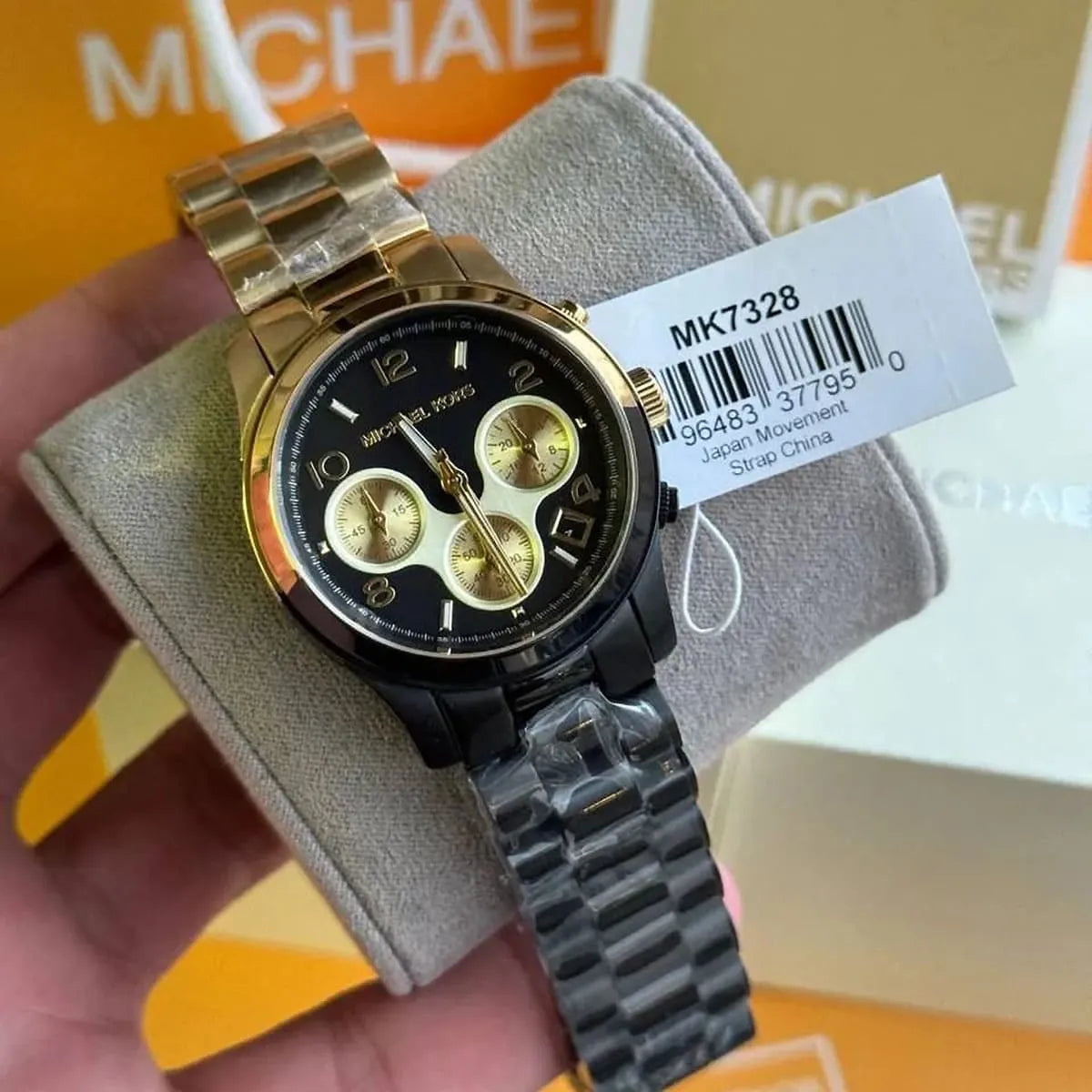 Michael Kors Runway MK7328 women's chronograph watch - black dial black and gold steel strap