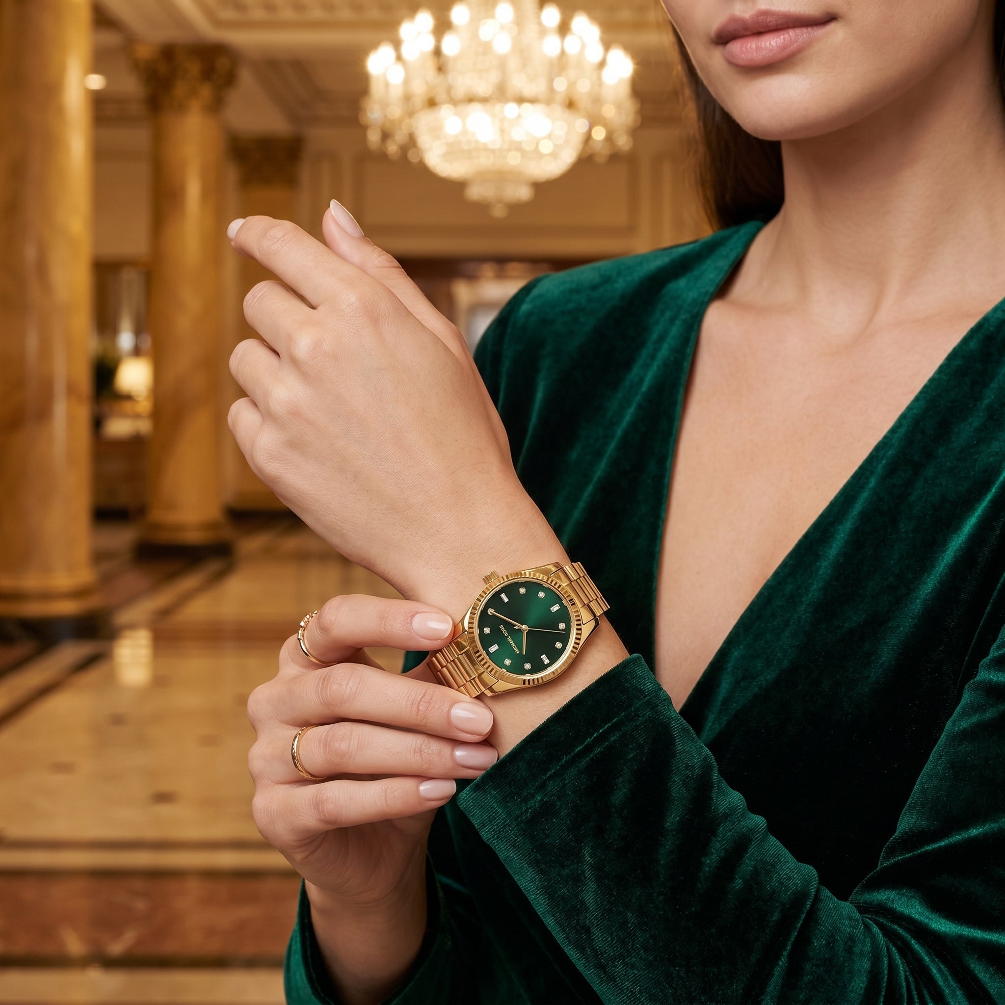 Lifestyle photo of Michael Kors MK7449 showing the elegant gold watch on a woman's wrist