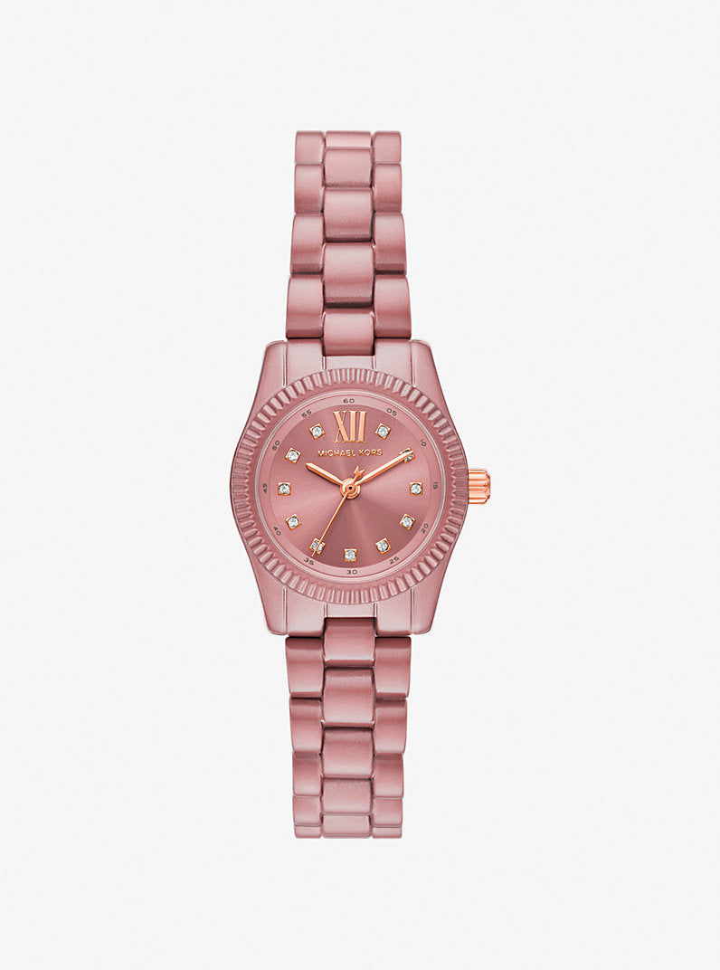 Authentic real-life photo of Michael Kors MK7518LE showing actual dusty rose finish and crystal indices
