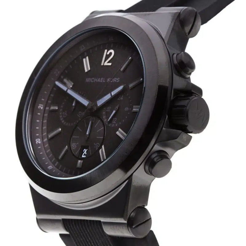 Black Michael Kors watch with a detailed face on a white background