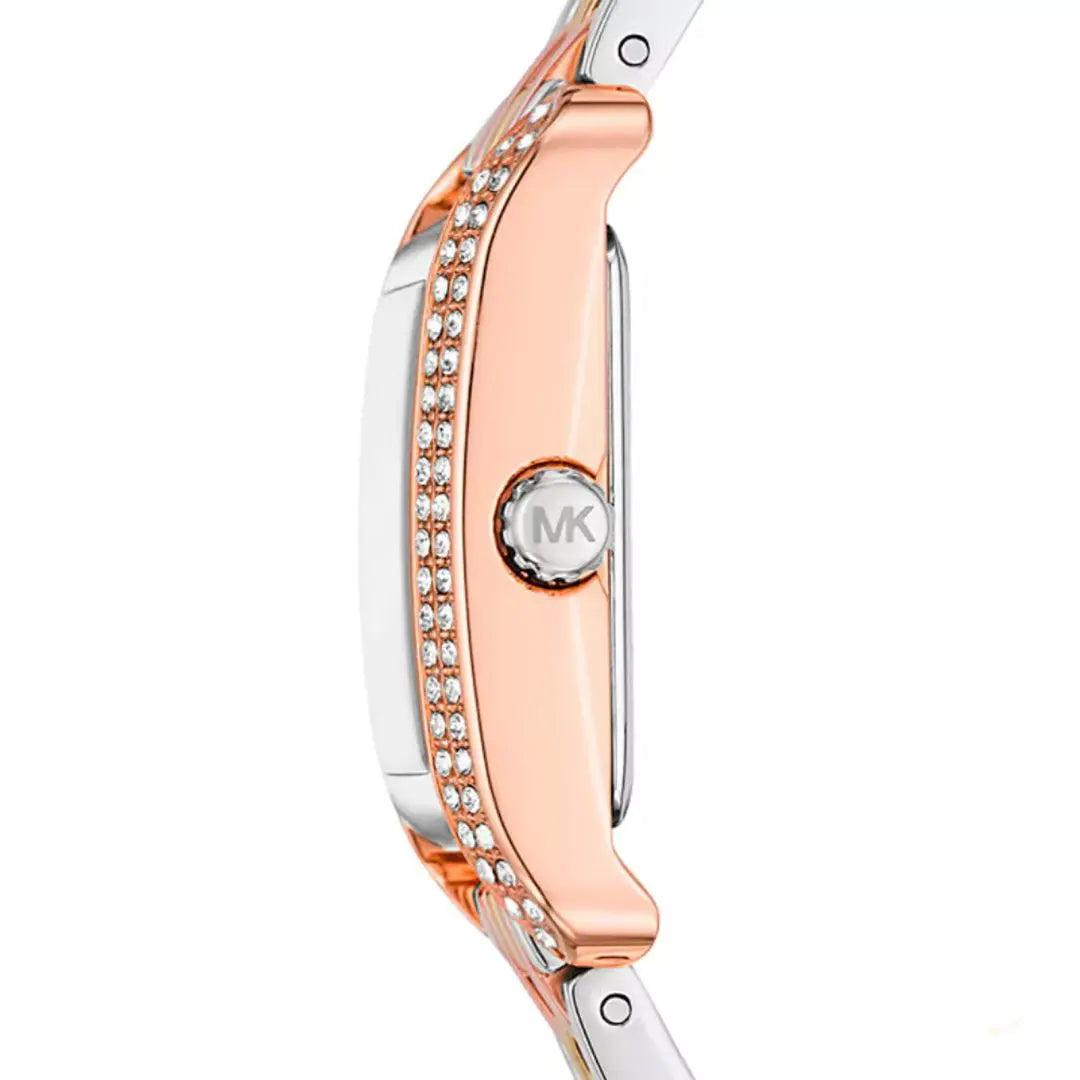 Angled real-life photo of Michael Kors mko1146 showing the polished tri-tone case and crystal detail