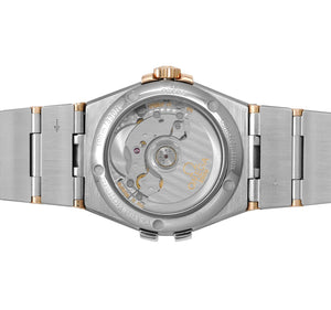 Omega Constellation 123.20.38.21.52.001 men's automatic watch, 38mm two-tone stainless steel and rose gold-tone case, silver dial, Roman numeral bezel, two-tone rose gold bracelet – case back view