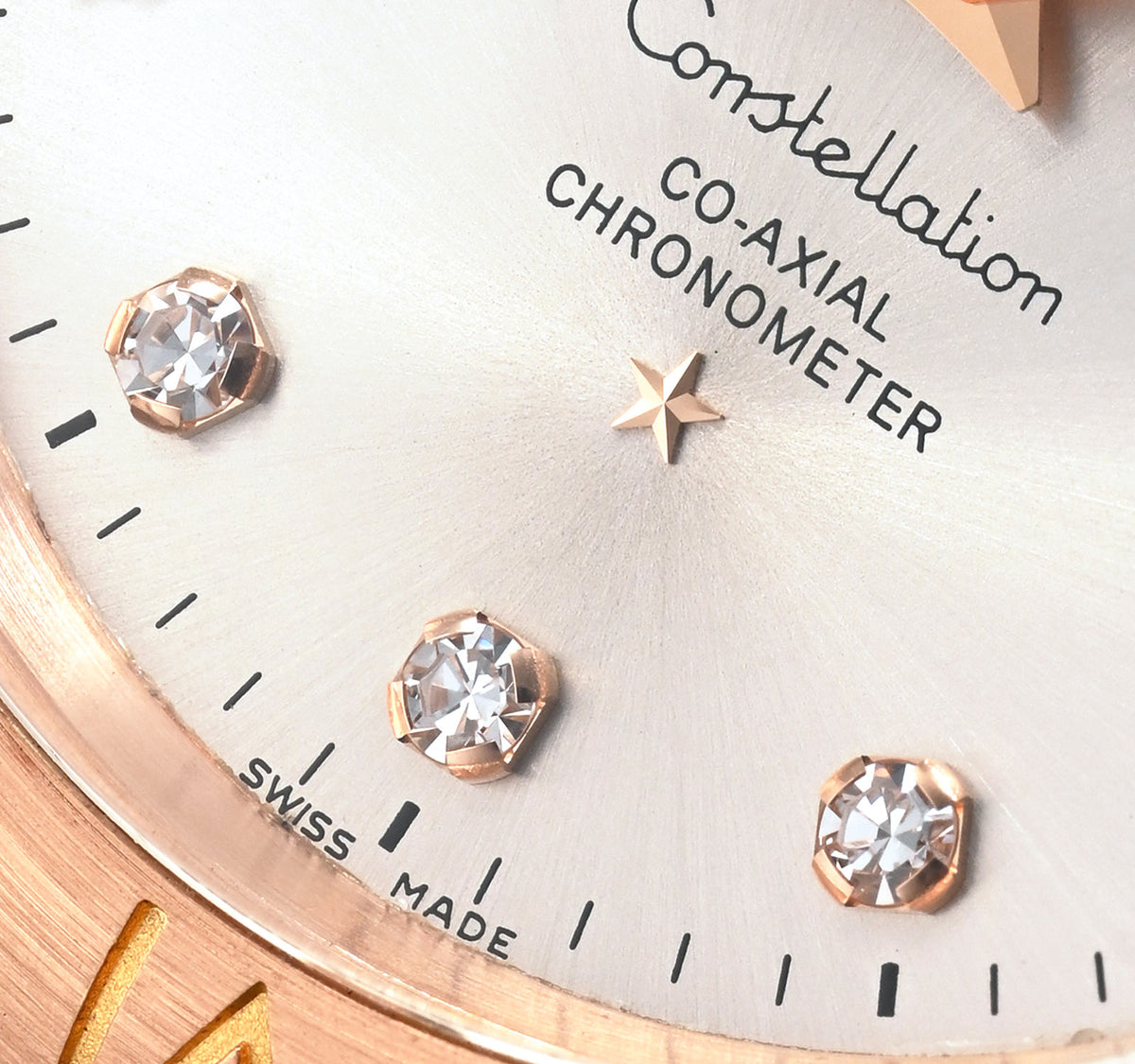 Omega Constellation 123.20.38.21.52.001 men's automatic watch, 38mm two-tone stainless steel and rose gold-tone case, silver dial, Roman numeral bezel, two-tone rose gold bracelet – dial detail close-up
