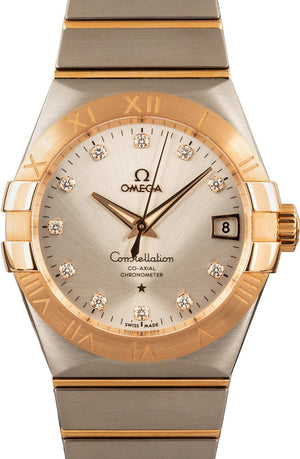 Omega Constellation 123.20.38.21.52.001 men's automatic watch, 38mm two-tone stainless steel and rose gold-tone case, silver dial, Roman numeral bezel, two-tone rose gold bracelet – front close-up view