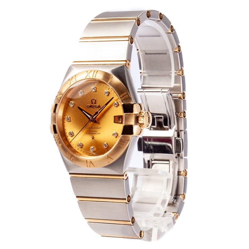 Omega Constellation 123.20.38.21.58.001 men's automatic watch, 38mm two-tone stainless steel and yellow gold-tone case, champagne Supernova dial, Roman numeral bezel, two-tone gold bracelet – side angle view, alternate