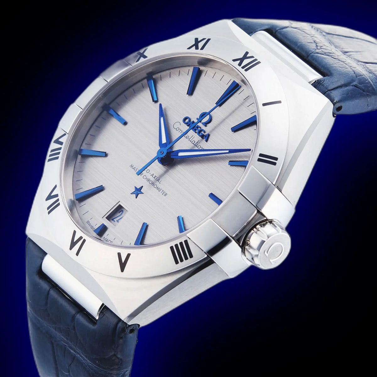Omega Constellation 131.13.39.20.06.002 men's automatic watch, 39mm stainless steel case, grey dial, blue leather strap – angle view on dark background